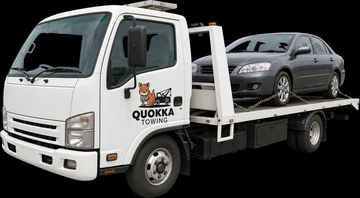 Quokka Towing tilt tray tow truck carrying a sedan in Perth